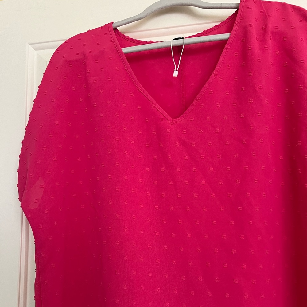 Hot pink 1XL  short sleeved shirt.